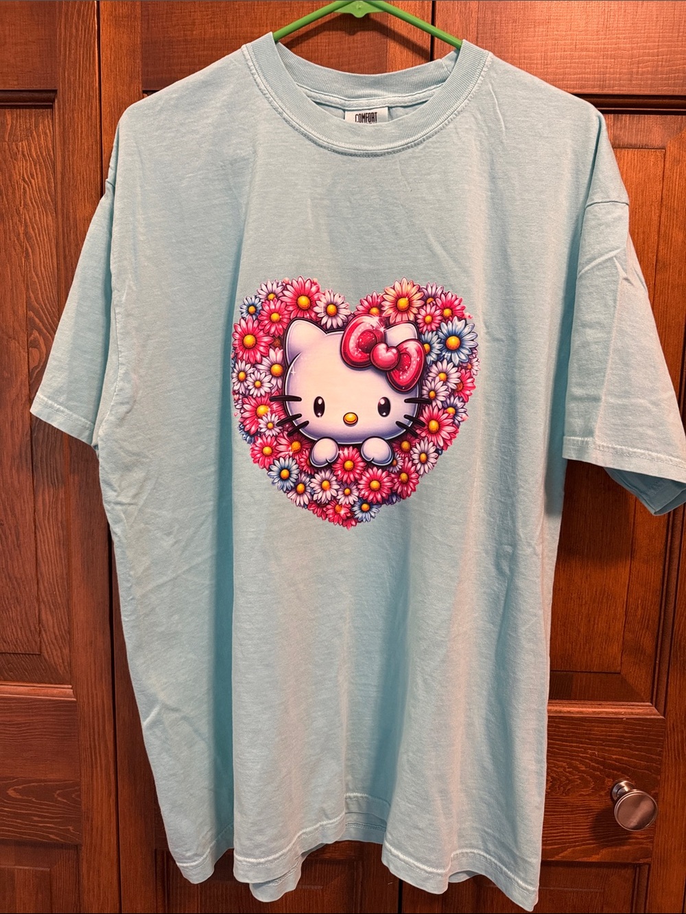 Hello Kitty Light Blue Tee with Floral Heart Graphic
